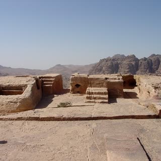 The rock-cut altar and basin on the High Place of Sacrifice plateau